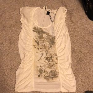 White shirt from buckle.